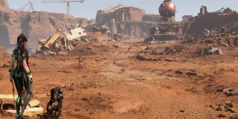 Eve looking out across a wasteland with a large dome structure in the background 