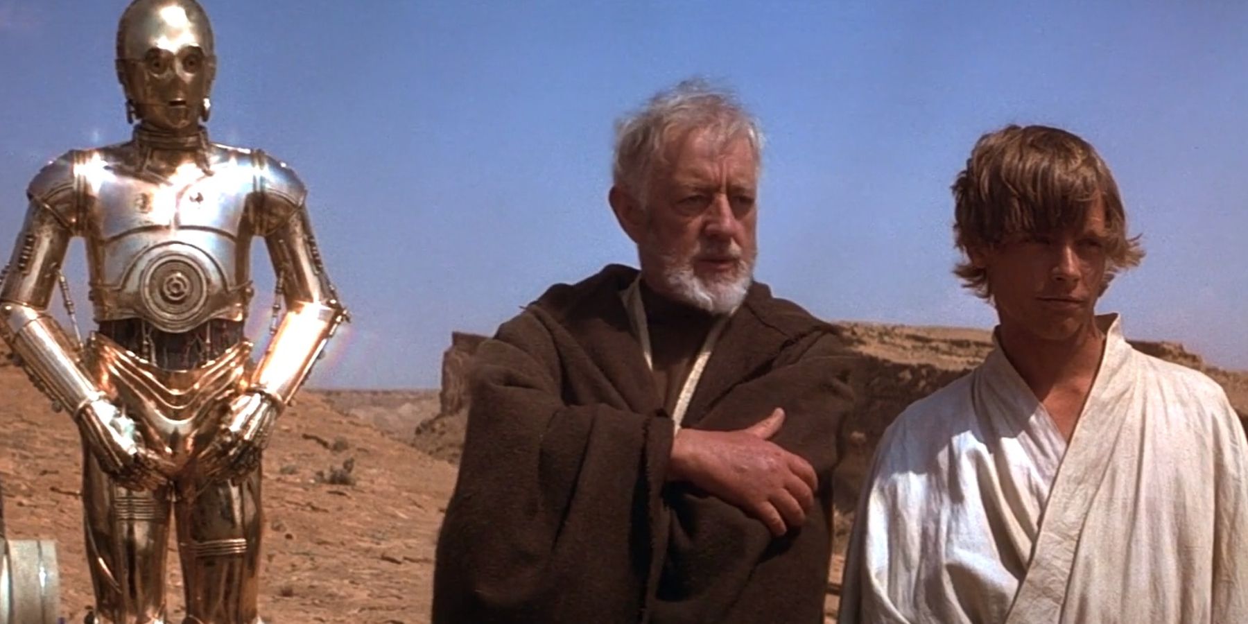 C-3PO, Obi-Wan Kenobi, and Luke Skywalker in Star Wars: A New Hope