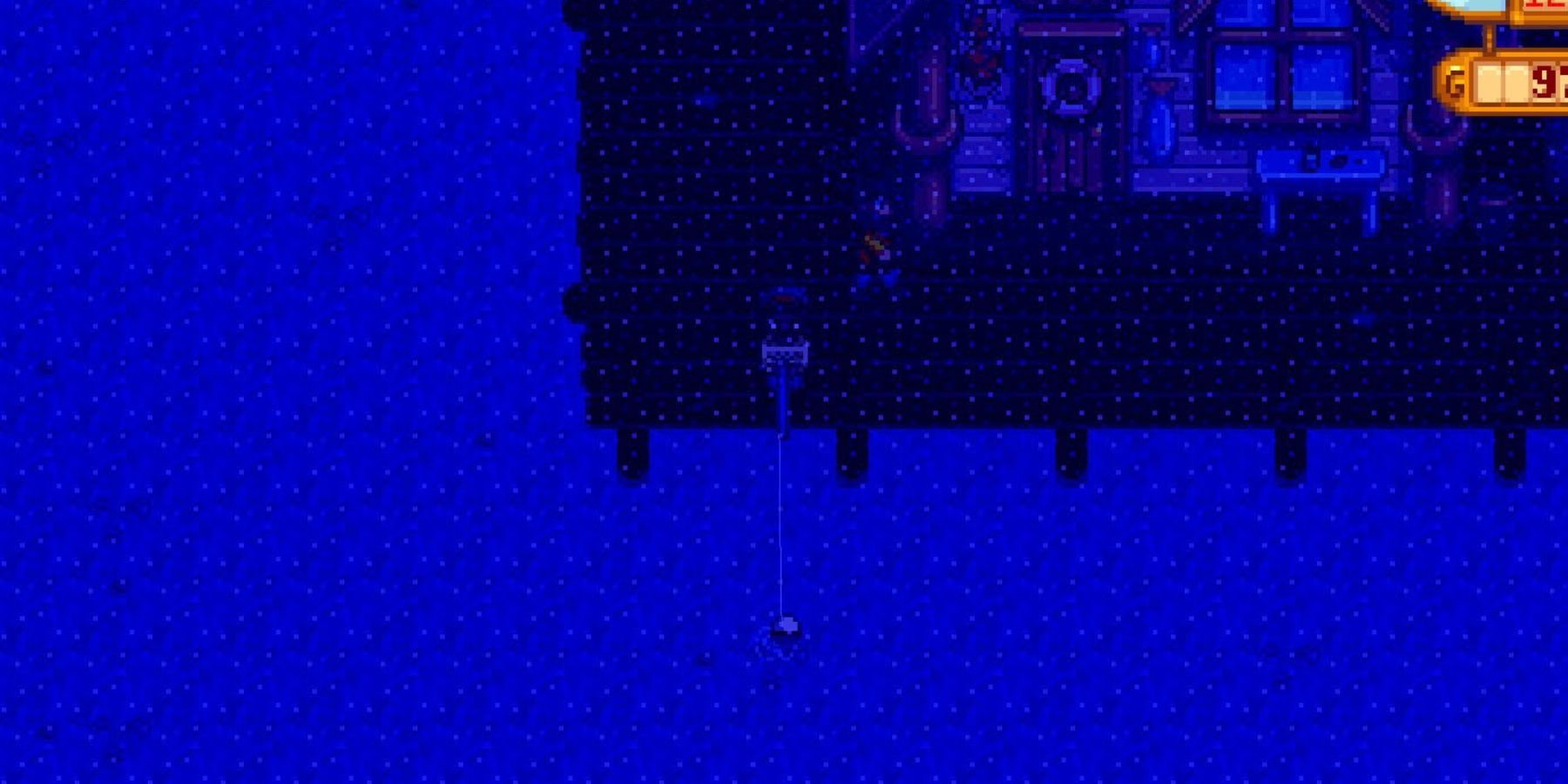 a player fishing at the beach in stardew valley