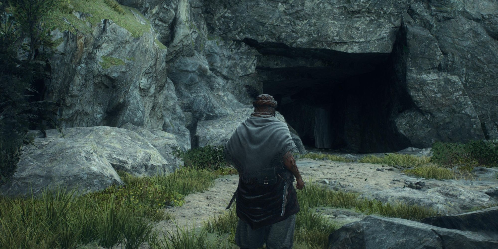 Image showing the Arisen standing in front of the Waterfall Cave.