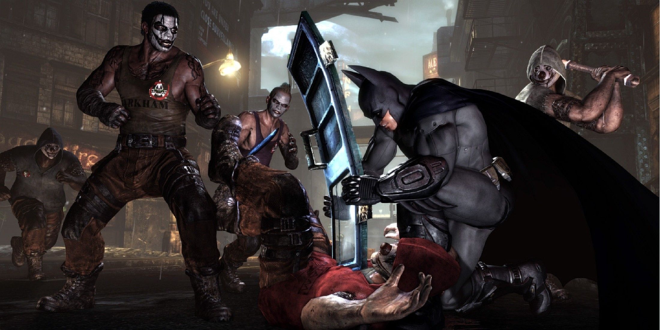 batman fighting several joker minions in batman arkham city