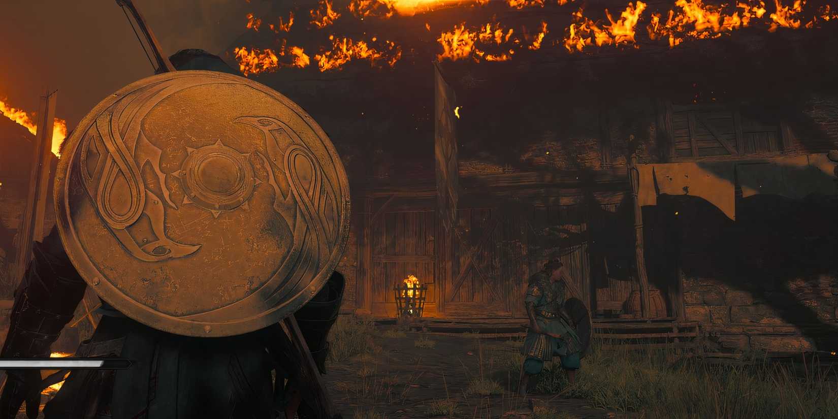 Assassin's Creed Valhalla - Eivor standing in a raided village