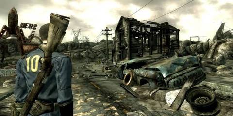Lone Wanderer standing in the middle of a ruined town in Fallout 3