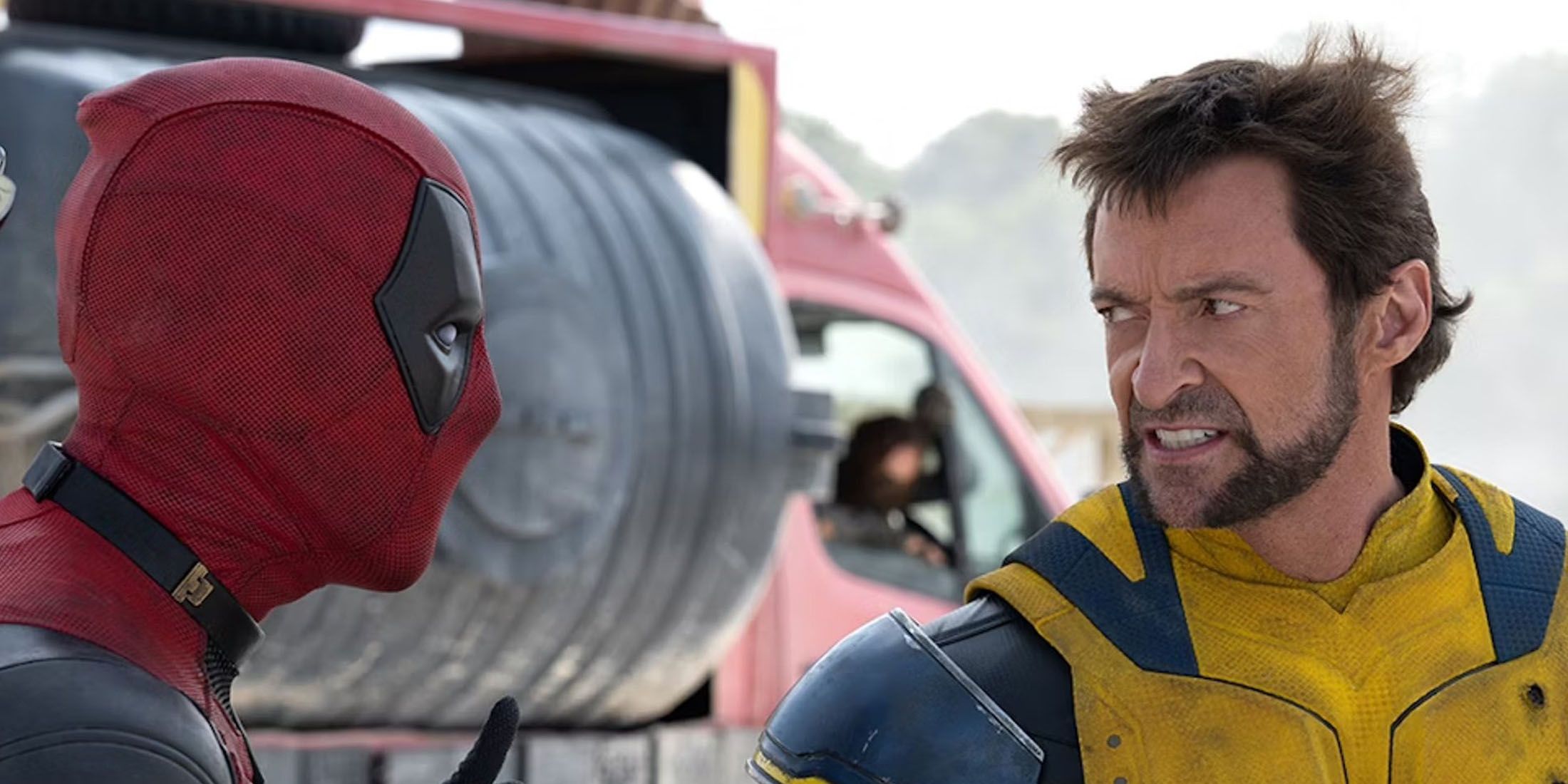 A screenshot of Wolverine and Deadpool looking at each other agressively in Deadpool & Wolverine.