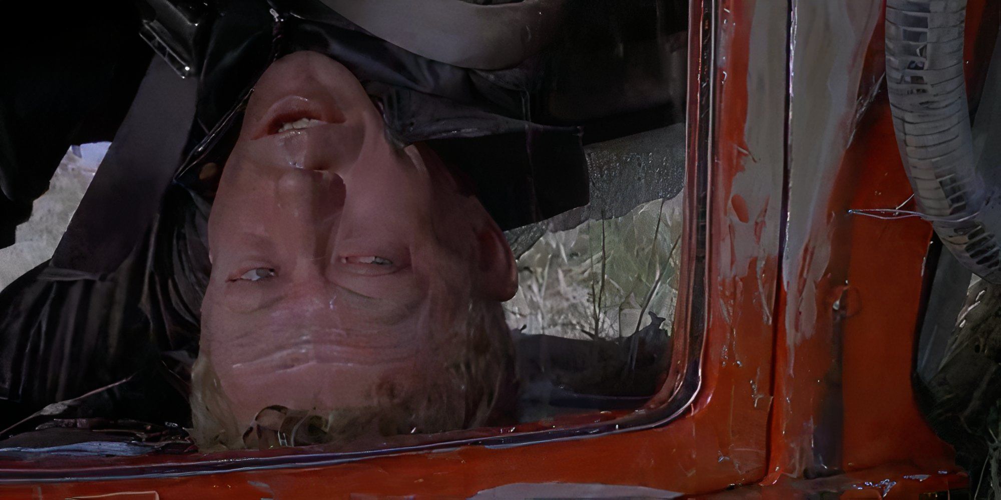 Goose upside down in his truck in Mad Max