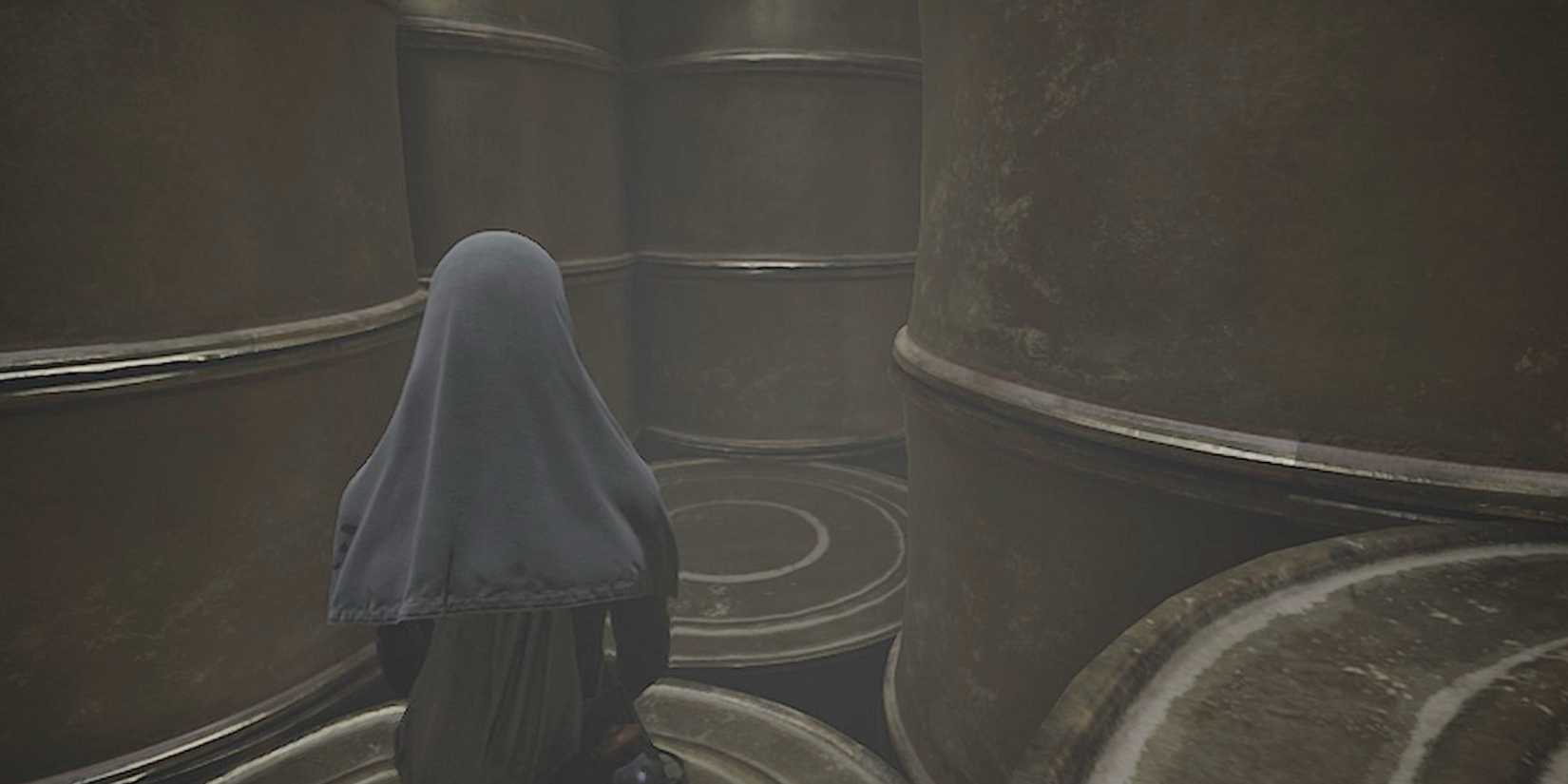 Indika walking through the giant fish cans