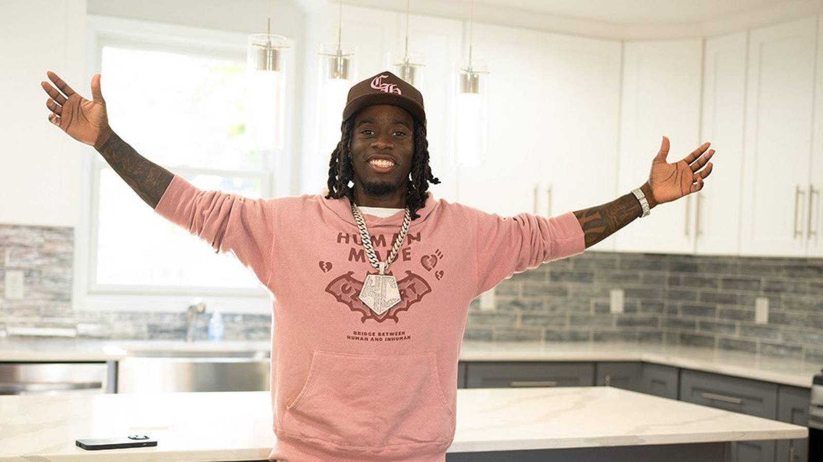 kai-cenat-twitch-partner-house-kitchen-white-walls-sunlight-2200x1100