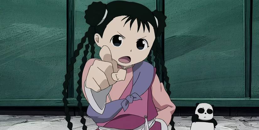 Wei Chang points her finger at the Elric brothers in Fullmetal Alchemist: Brotherhood