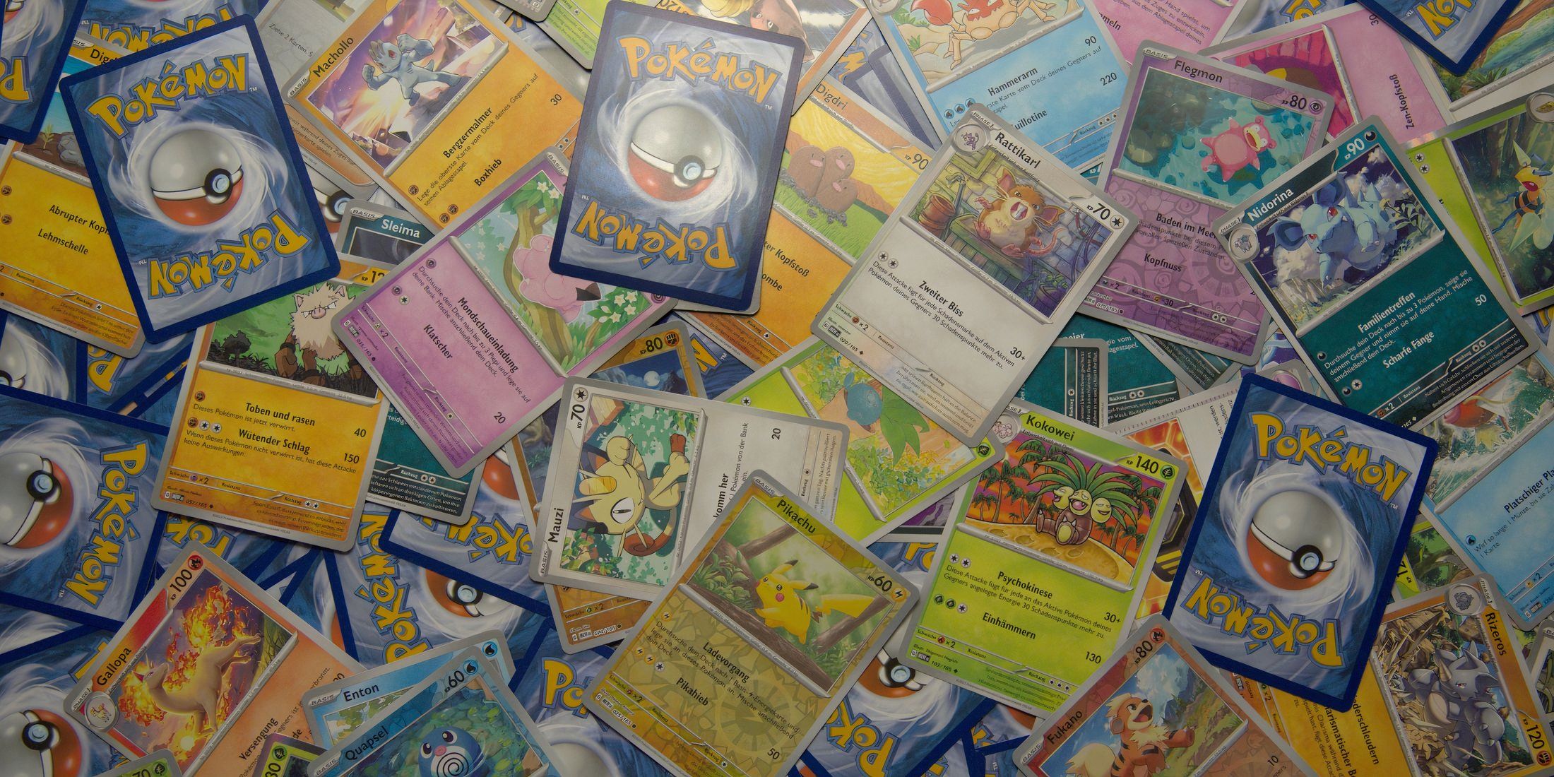 a pile of pokemon tcg cards.