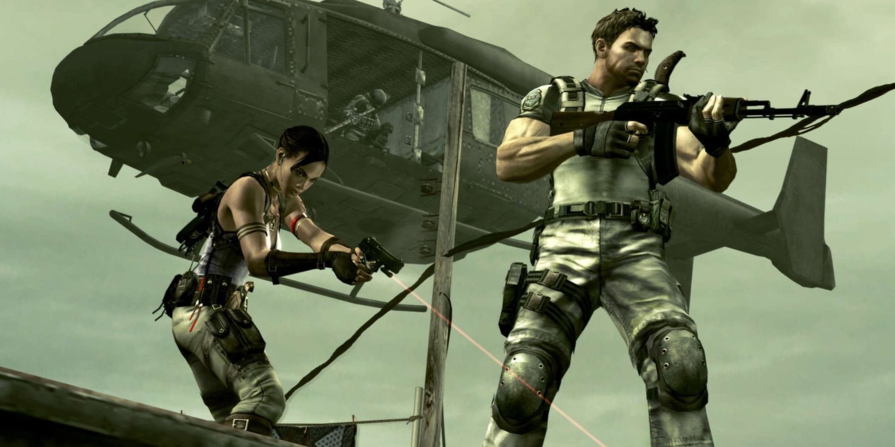 chris and sheva standing in front of a helicopter