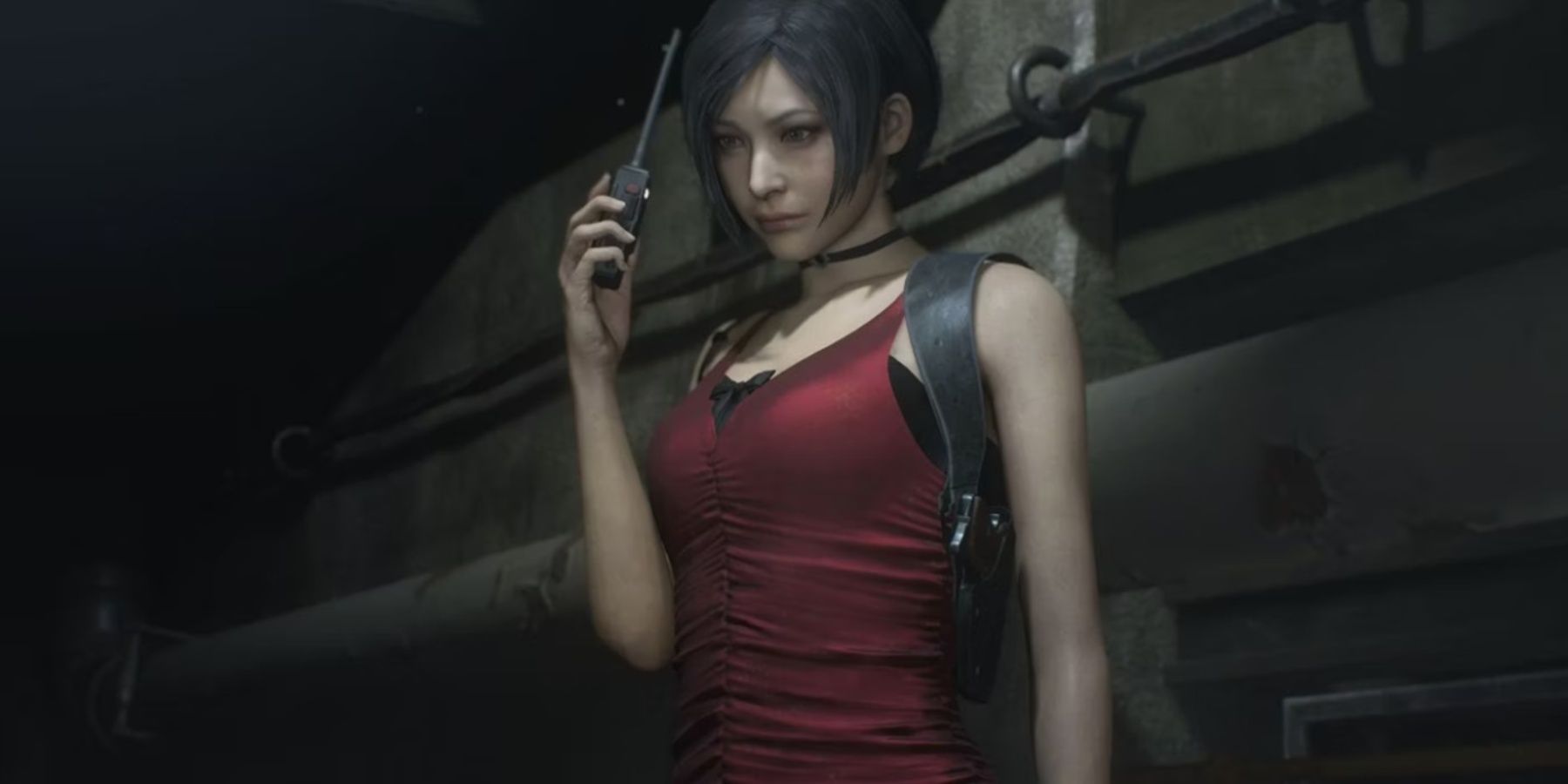 Resident Evil 2 Remake Ada Wong holding a walkie-talkie
