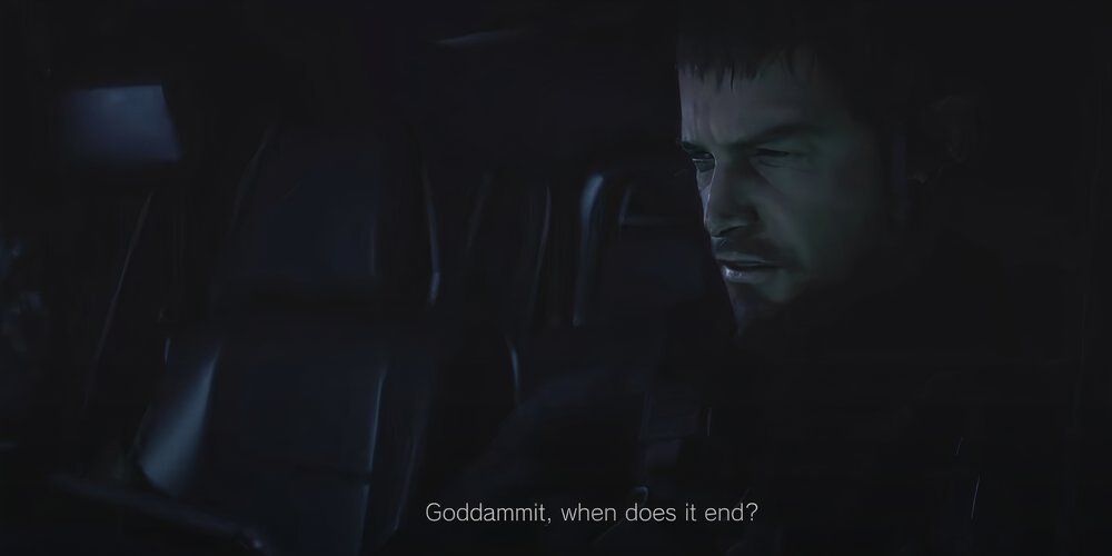 Chris asking himself when it will end while sat in a dark car 
