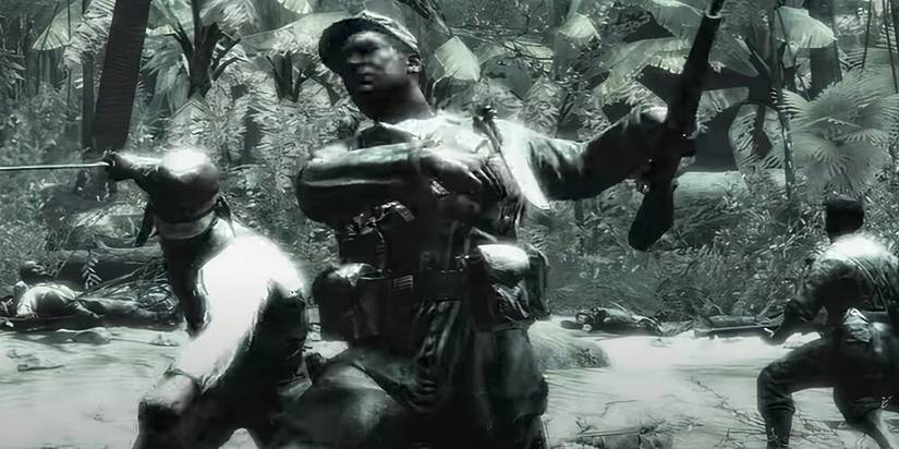 Japanese soldier slashing a swear at a US soldier from behind in a jungle 