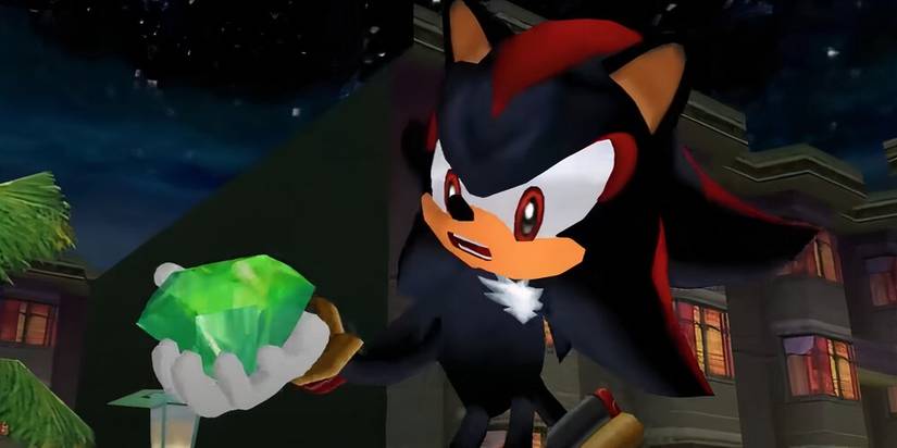 Shadow holding a green Chaos Emerald 