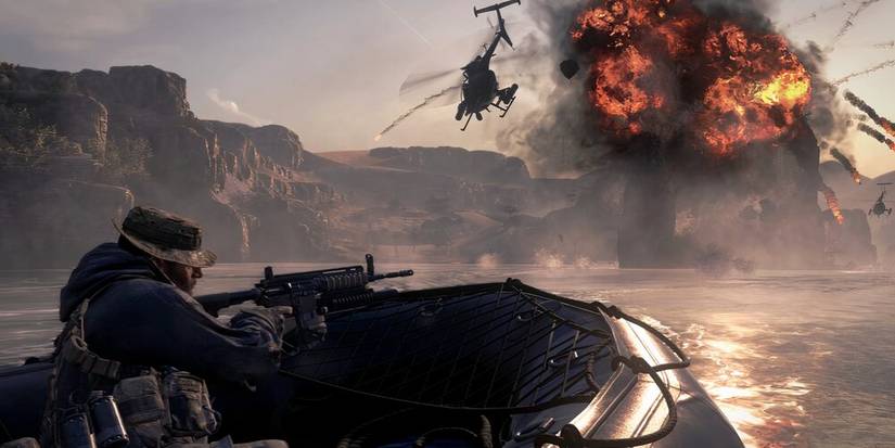 Price in a boat shooting a helicopter in the sky 