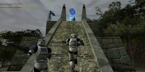 a squad of stormtroopers rushing up temple steps
