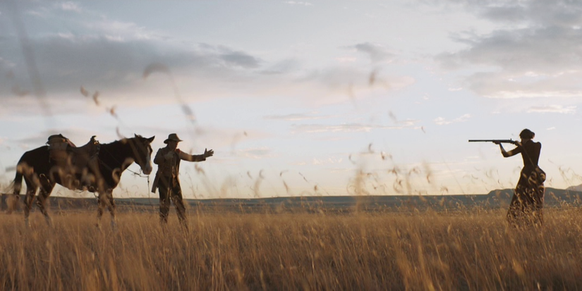 The Wind western horror screen cap, man with horse and woman with gun