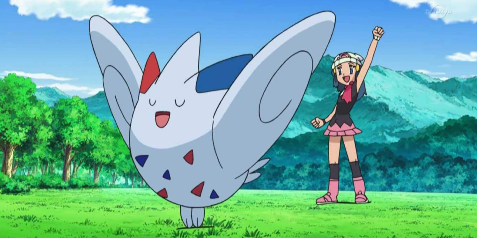 Togekiss celebrates alongside Dawn.
