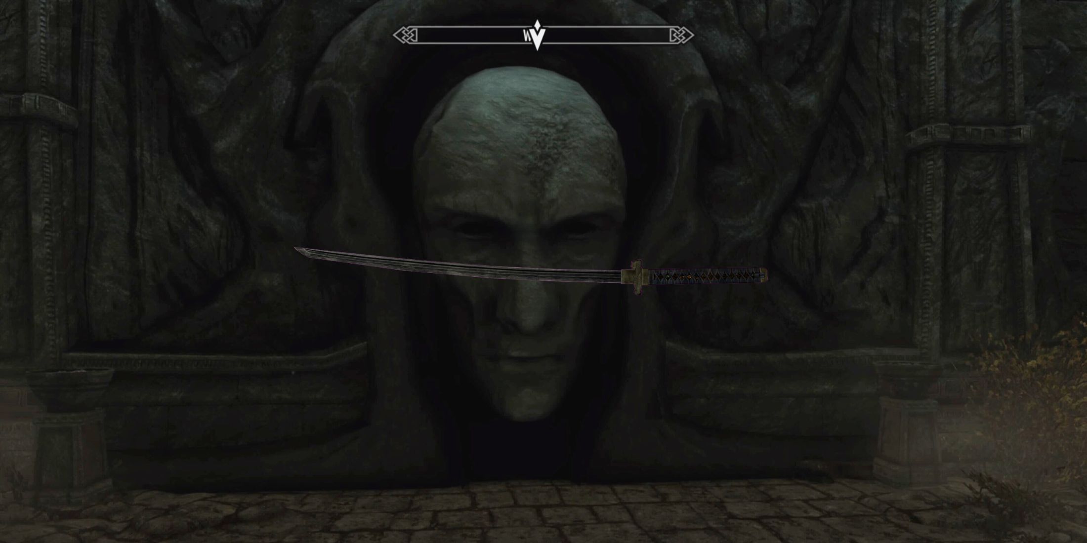 The entry to the Sky Haven Temple in Skyrim and the Dragonbane sword