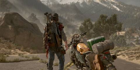 Deacon standing next to his bike in Days Gone