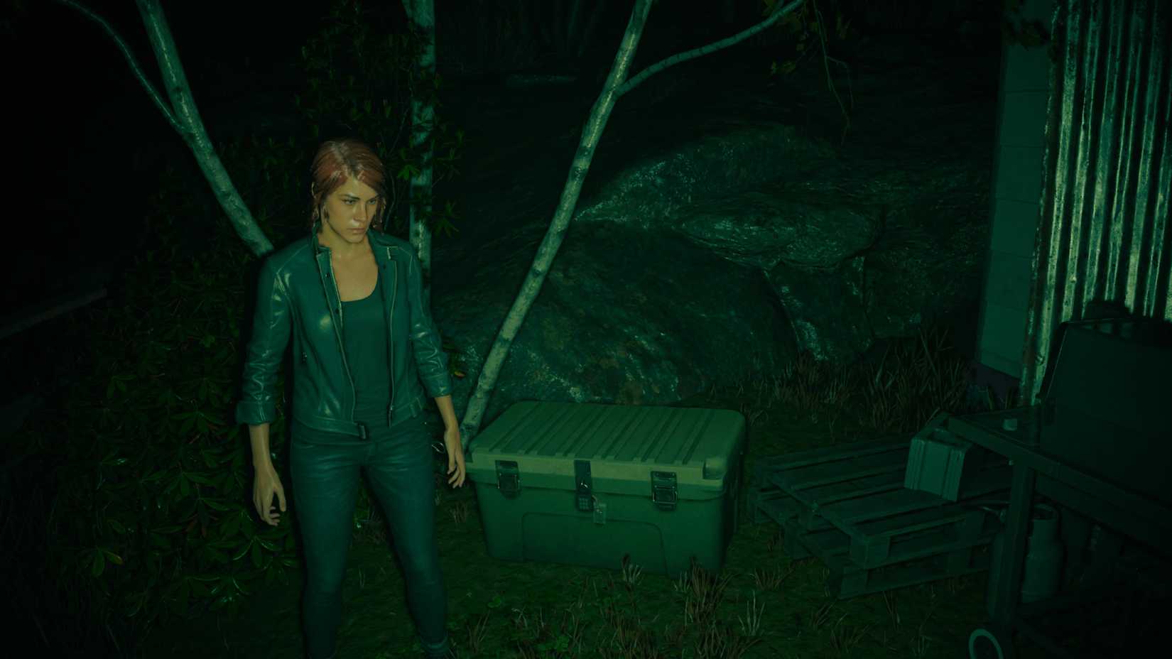 Jesse next to a Stash in Episode 2 in Alan Wake 2; Night Springs