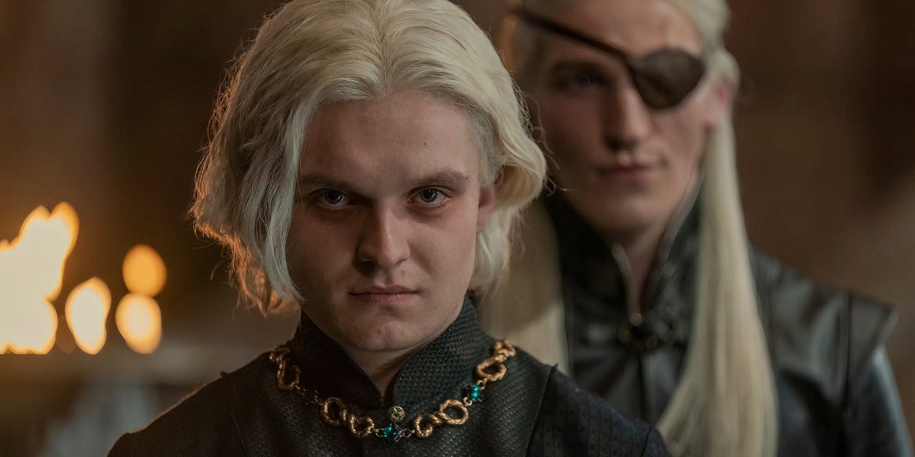 King Aegon Targaryen with his brother Aemond Targaryen who wears an eyepatch in House of the Dragon