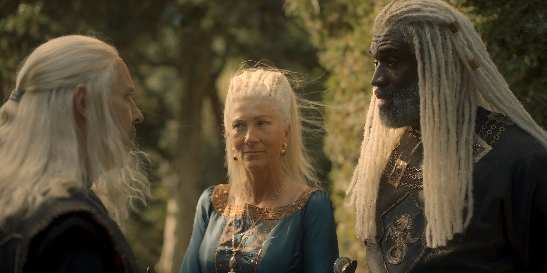 King Viserys Targaryen talking with his cousin Rhaenys Targaryen and her husband Corlys Velaryon in House of the Dragon