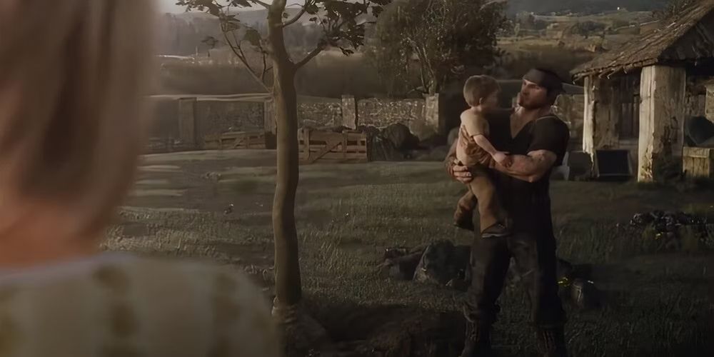 Marcus holding his son JD in Gears of War 4