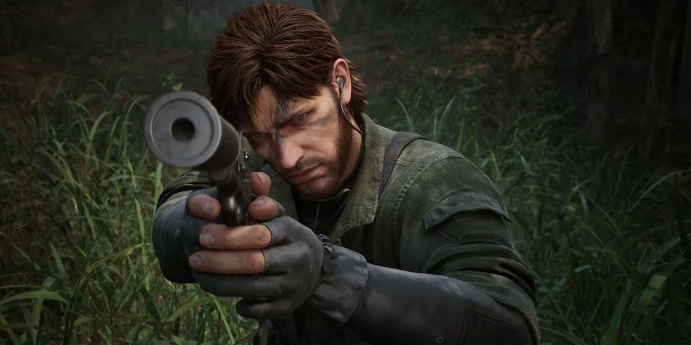 A screenshot of Naked Snake aiming his gun at the camera in Metal Gear Solid Delta: Snake Eater.