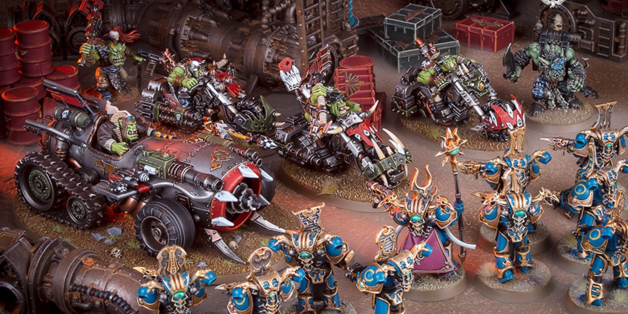 Warhammer 40k: 7 Reasons to play Orks An ork army of Vehicles charges against a thousand sons army