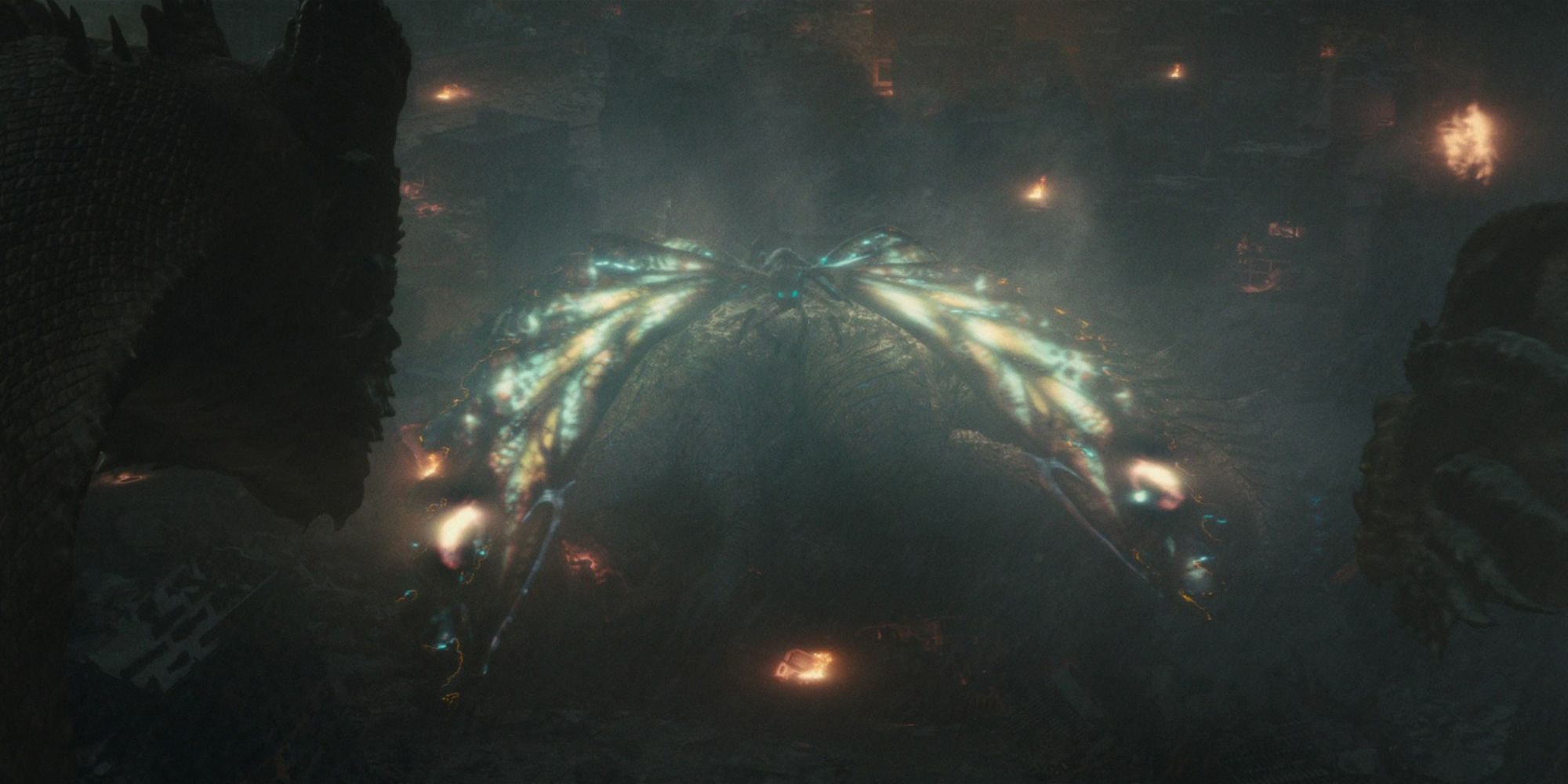 Mothra protects Godzilla from King Ghidorah's attack in Godzilla: King of the Monsters