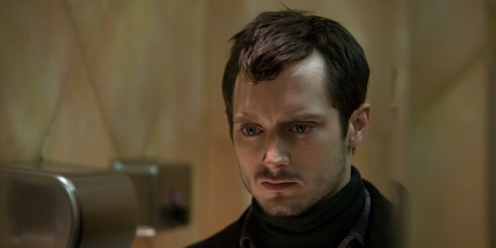 Elijah Wood as Frank