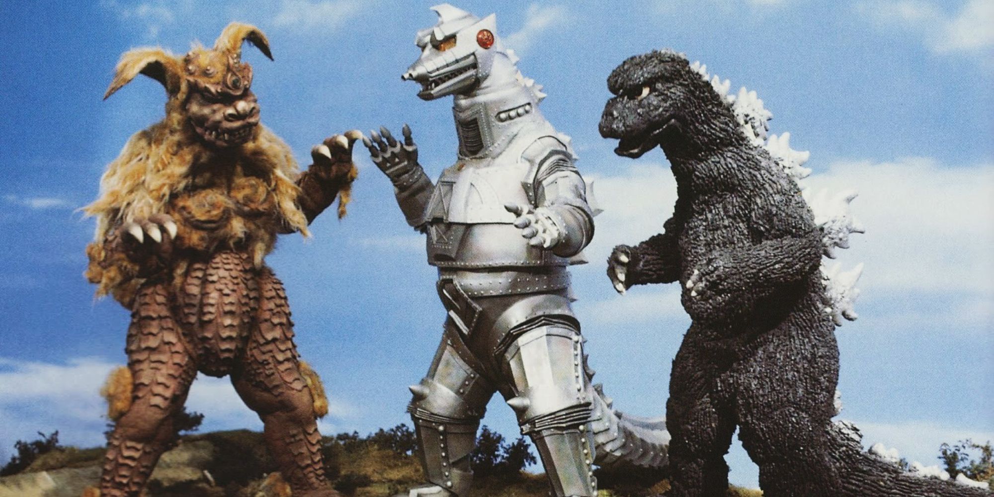 Official promotional image of King Caesar and Godzilla fighting Mechagodzilla in Godzilla vs. Mechagodzilla