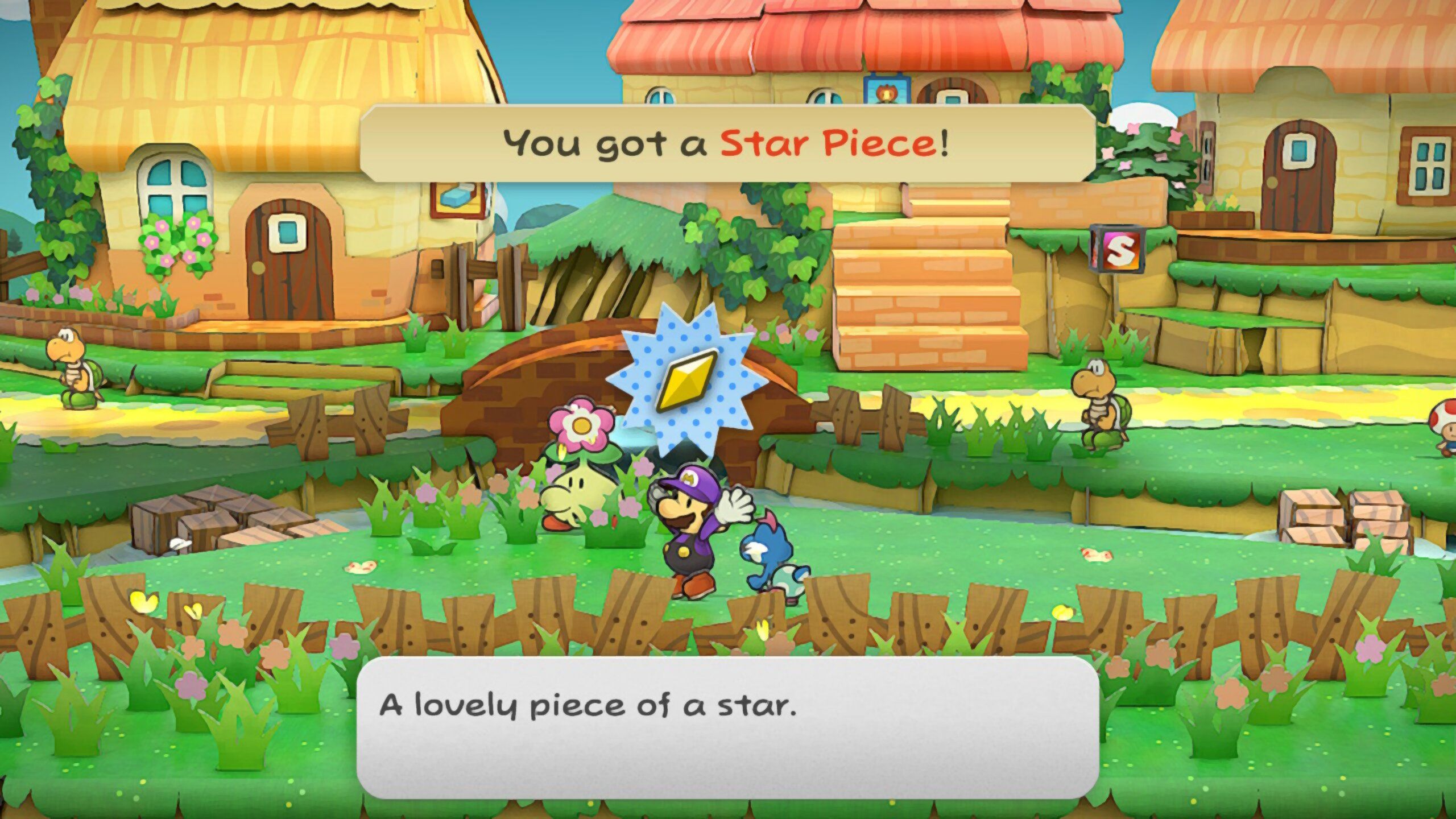 Image of a star piece in the grassy area of Petalburg in Paper Mario TTYD