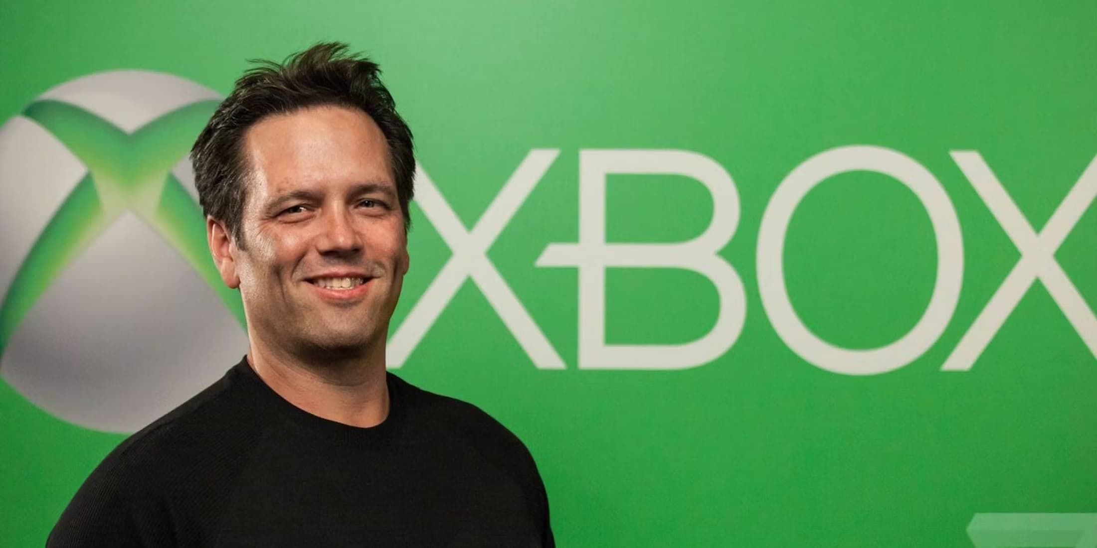 Phil Spencer with the Xbox logo in the background