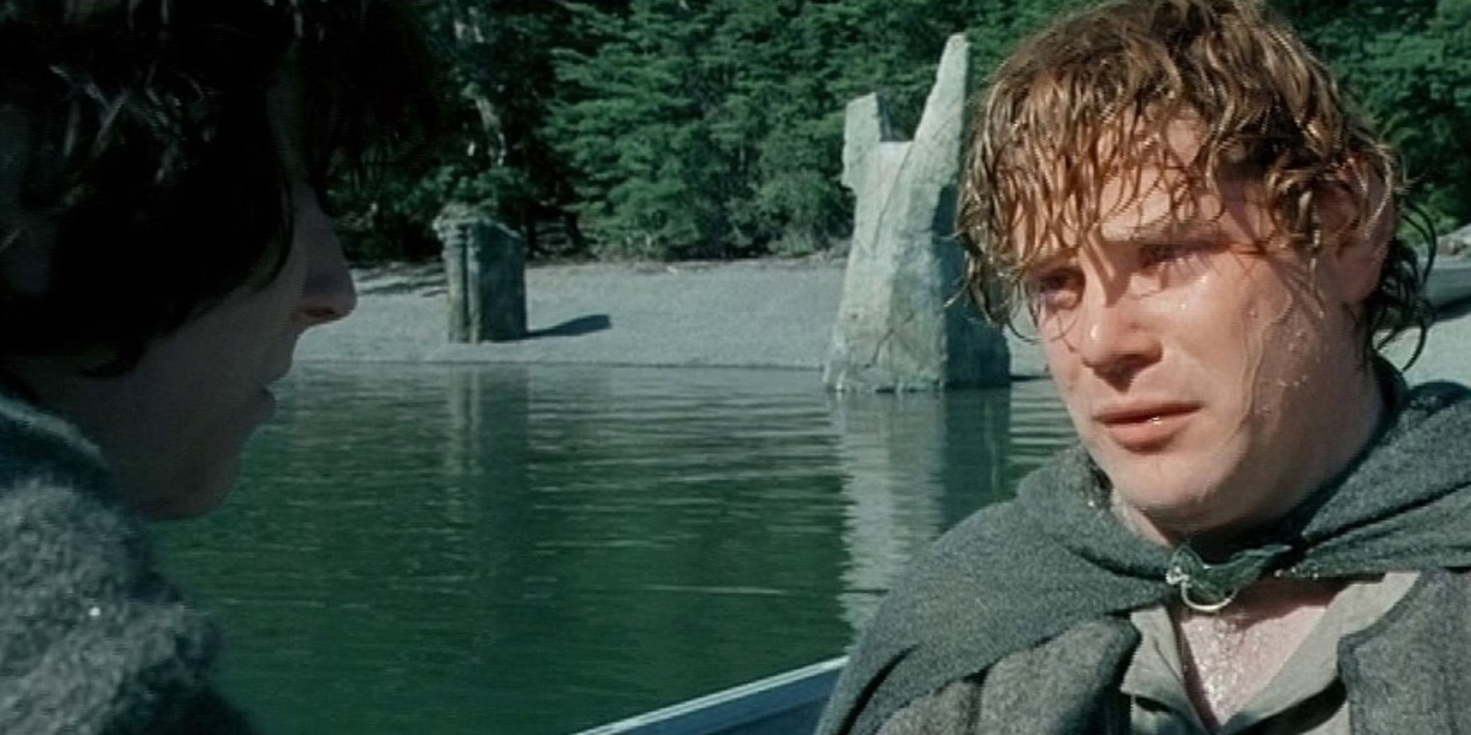 Sam in the boat with frodo after he follows him to Mordor in The Lord of the Rings_ The Fellowship of the Ring