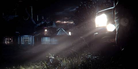 Baker estate being lit up by a car light 