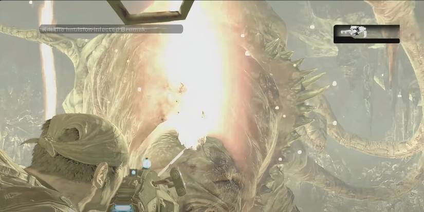 Marcus firing a Hammer of Dawn at an infected Brumak 