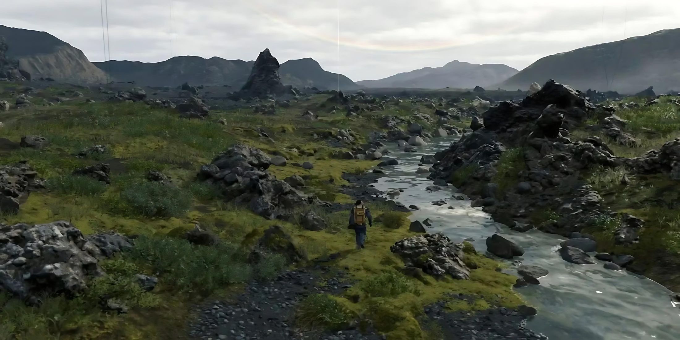 A wide shot of Sam from Death Stranding walking