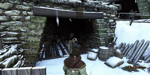 The Player Standing In Front Of A Shop Worker