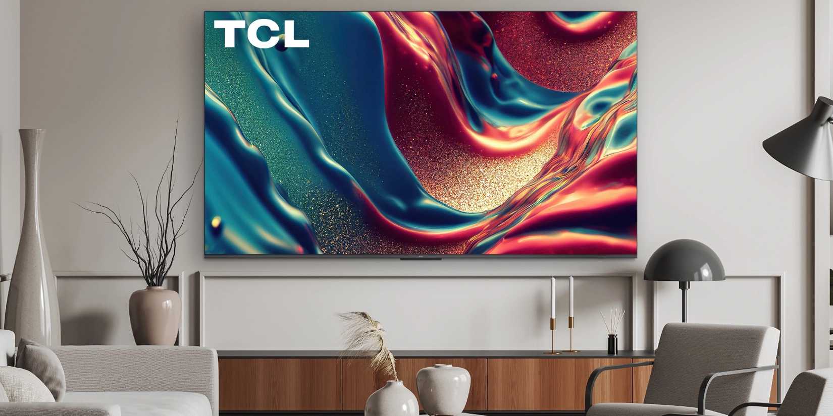 A TCL TV mounted on the wall