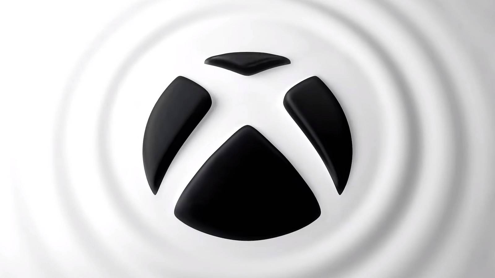 black xbox logo surrounded by white ripples