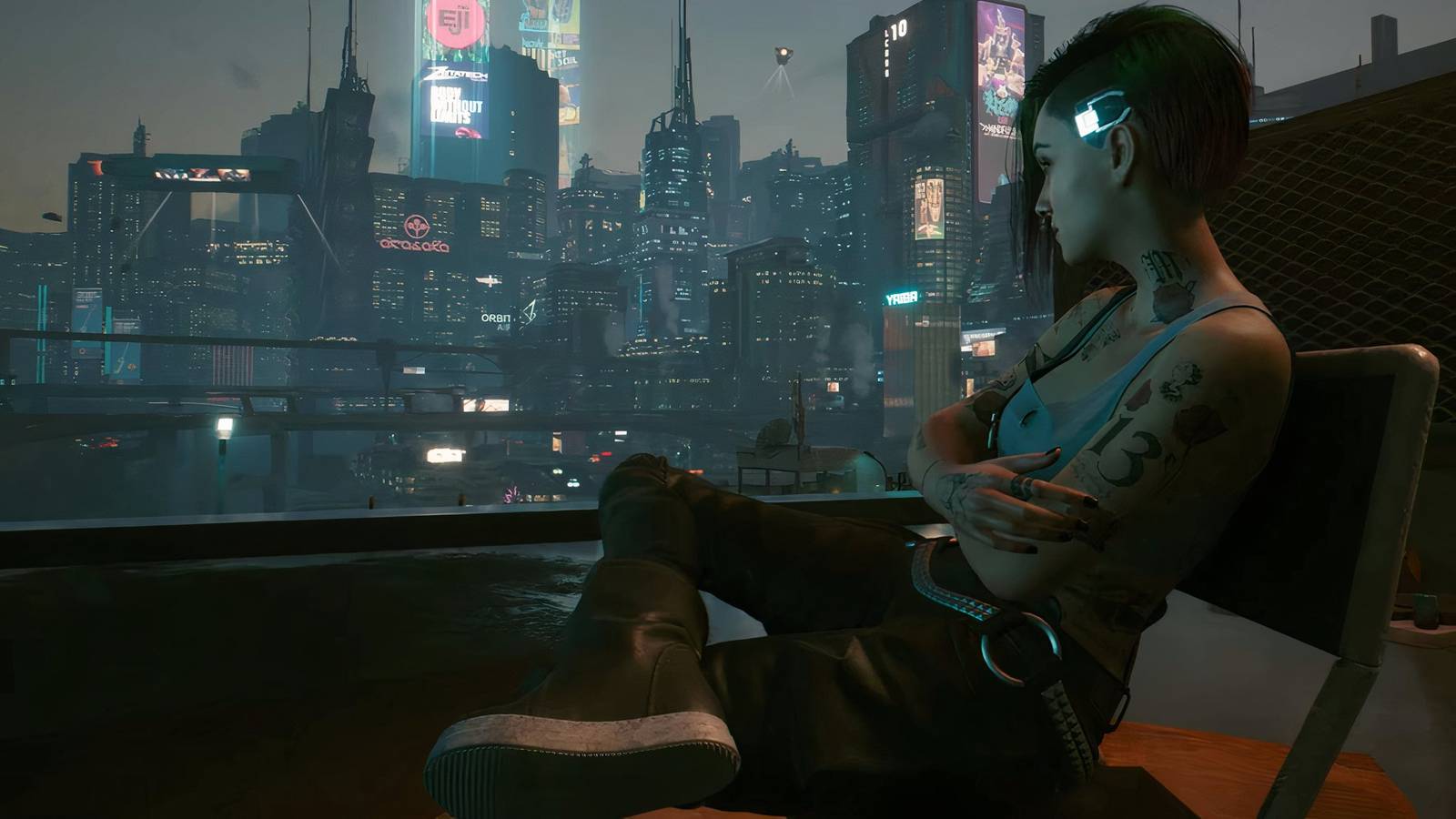 Cyberpunk 2077 character in foreground looks out over Night City skyline