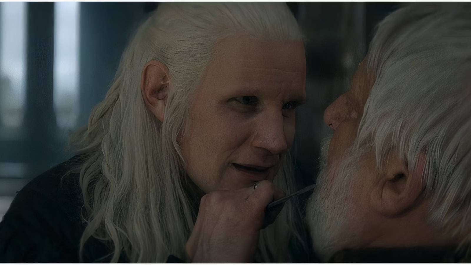 Daemon Targaryen holds a knife to Ser Simon Strong's throat in House of the Dragon