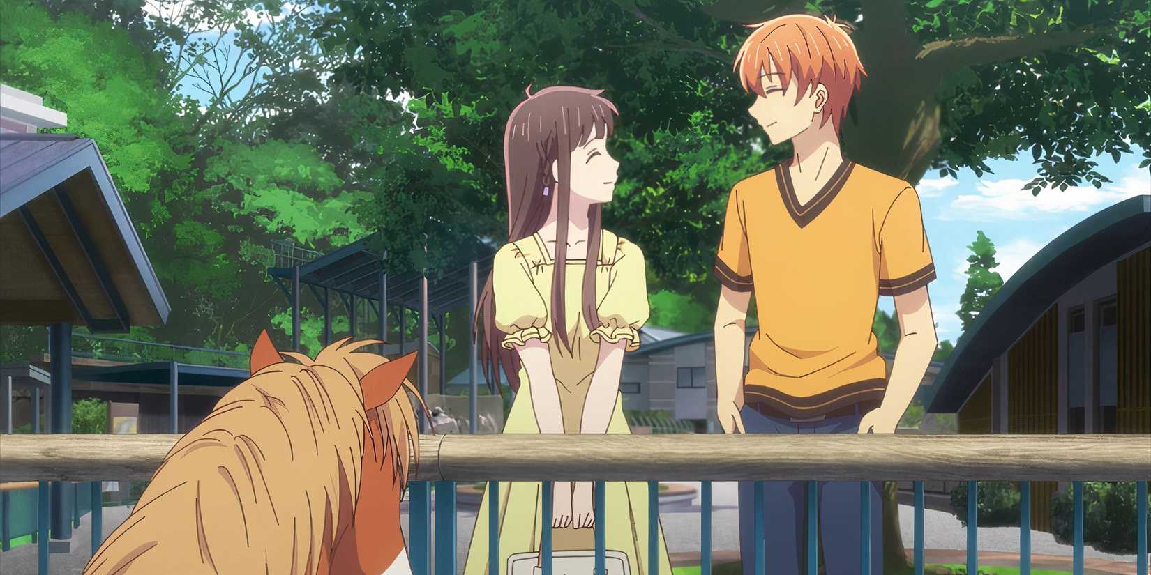 Two characters smiling at each other in Fruits Basket