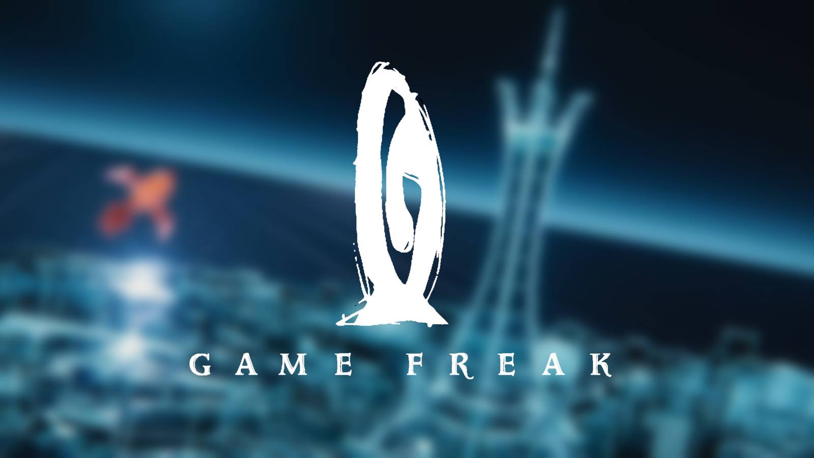 Game Freak's logo atop a blurred screenshot from Pokemon Legends: Z-A's reveal trailer.