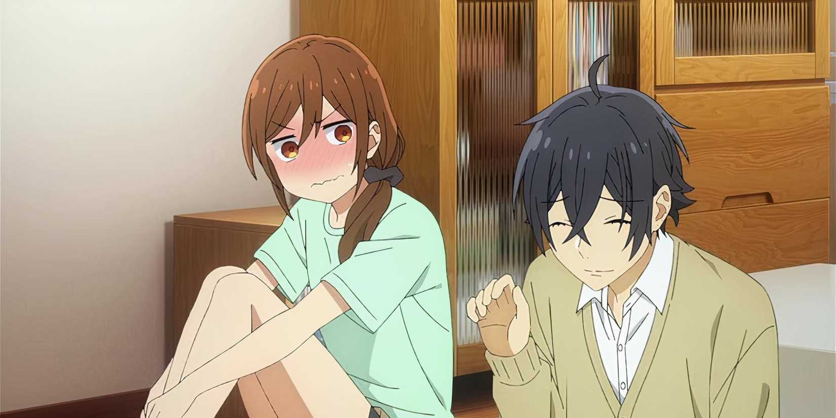 Two characters sitting together in horimiya