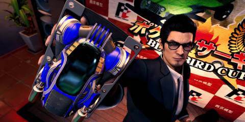 Image of Kiryu holding a car in LAD Gaiden