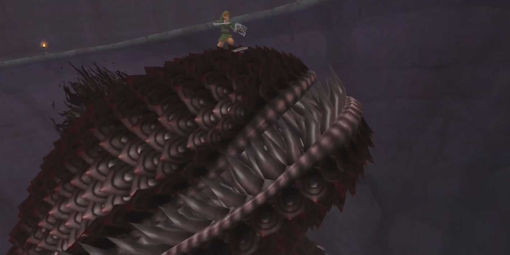 Link climbs up to the Imprisoned's head in order to strike it down.