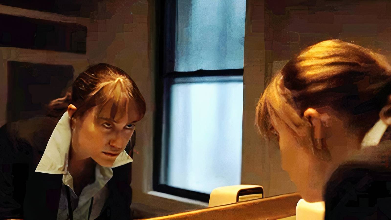 agent harker looking in the mirror